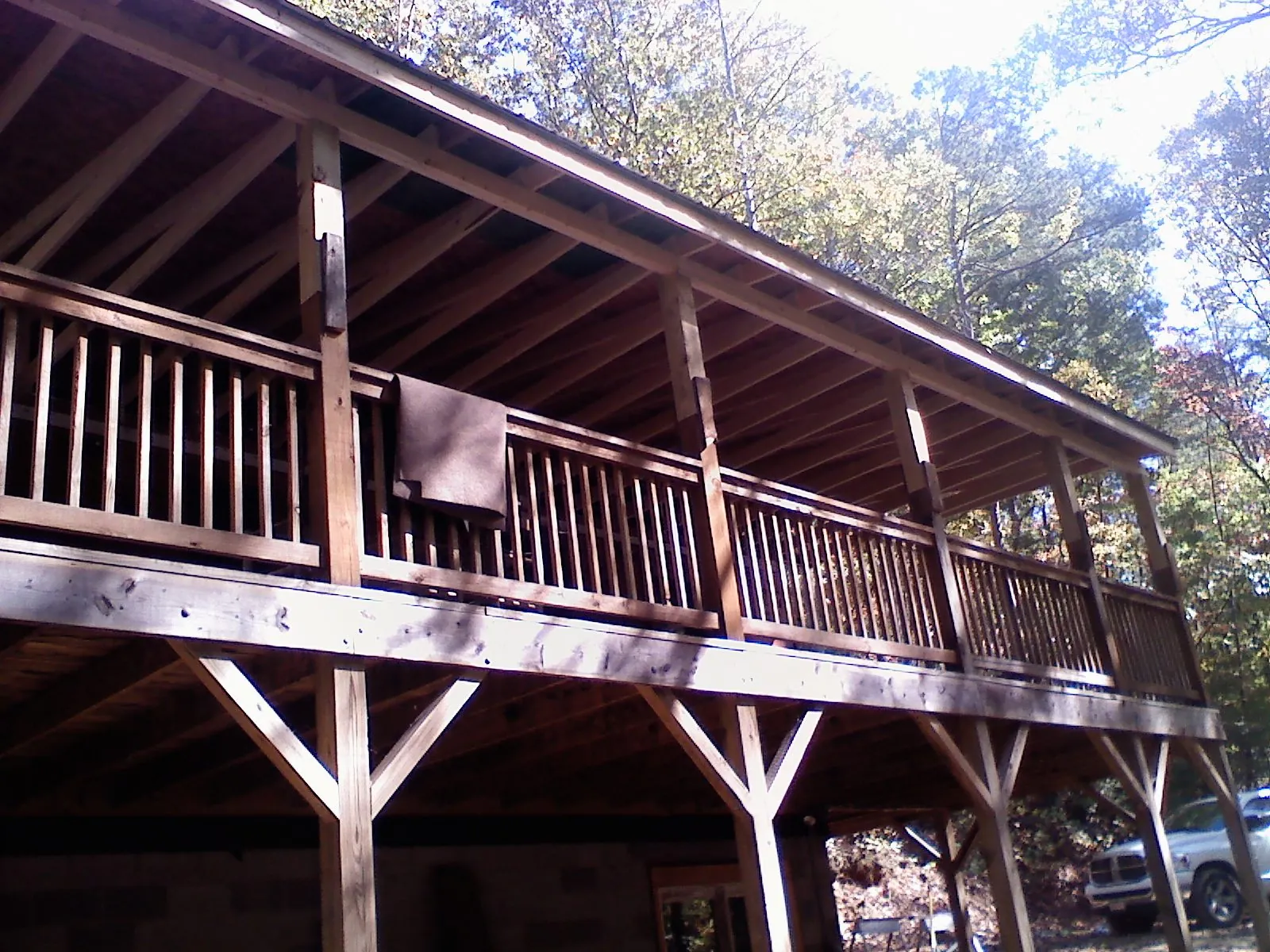 Timber framing under a new elevated porch and deck — Roof Leak Repair in Roan Mountain by Roofing Brothers